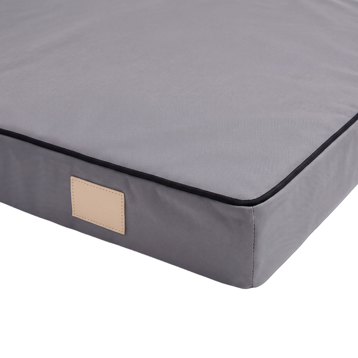 Flat foam dog mattress corner detail cutout with the background removed