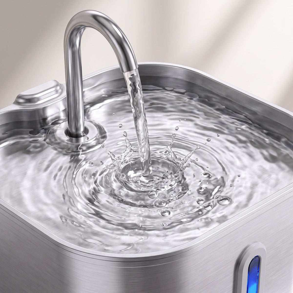 Close-up of water falling from the fountain spout and rippling across the basin surface